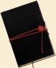Black leather travel journal
