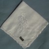 White ladies handkerchief with white embroidery and scalloped edge